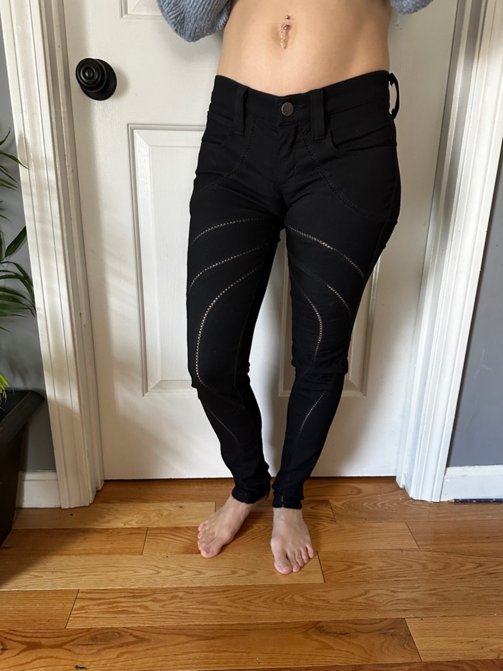 Frankie B. Black Low Rise Stretch Skinny Jeans with Curved Cut Out Detailing